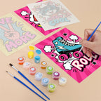 Filling in a Pop Attitude mini canvas with numbered acrylic paints and a fine brush