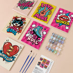 Pop Attitude mini paint by numbers kit with six numbered canvases, acrylic paints, brushes and layout