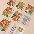 Poppy Parade mini paint by numbers kit with six numbered canvases, acrylic paints, brushes and layout