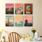 Postcards from Afar mini paintings displayed as a gallery wall in a sunny kitchen