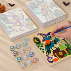 Painting one of the Potion Shop Animals designs next to a stack of mini canvases