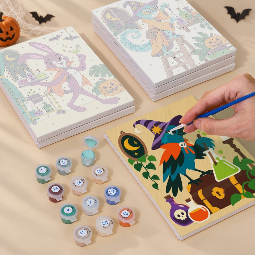 Painting one of the Potion Shop Animals designs next to a stack of mini canvases