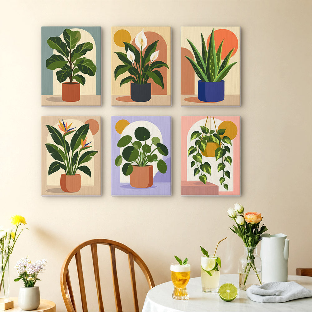 Potted Greens mini paintings displayed as a gallery wall in a sunny kitchen