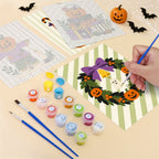 Filling in a Pumpkin Festivities mini canvas with numbered acrylic paints and a fine brush
