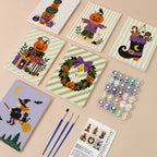 Pumpkin Festivities mini paint by numbers kit with six numbered canvases, acrylic paints, brushes and layout