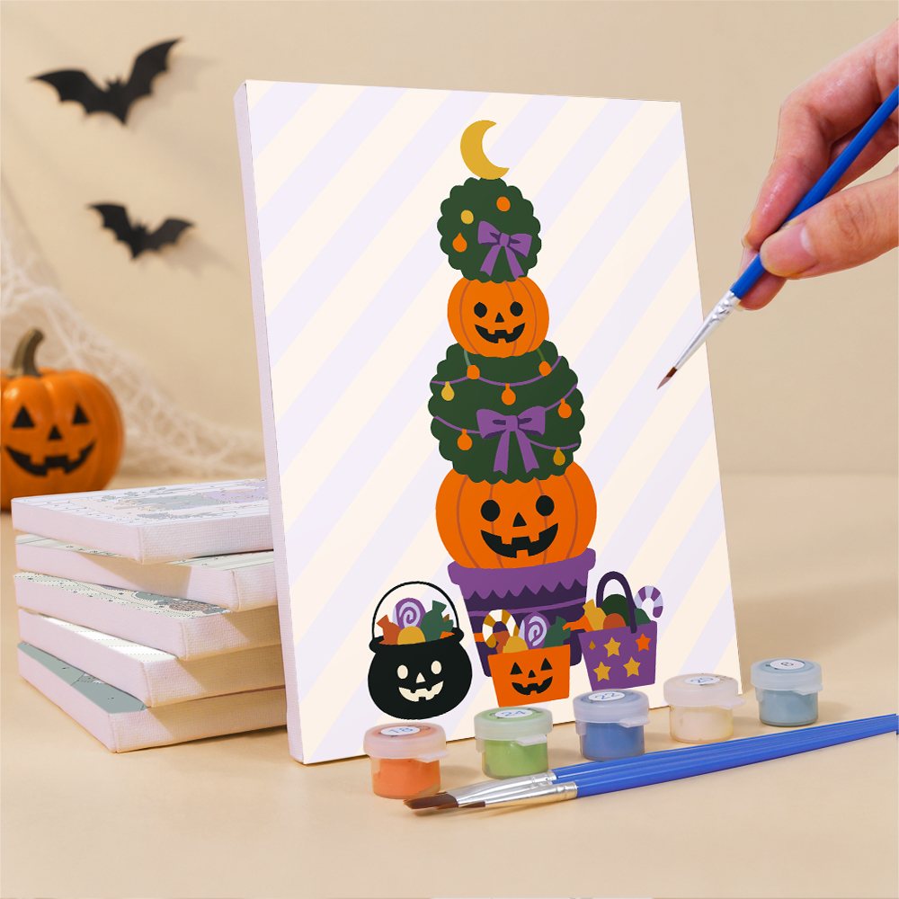Painting a Pumpkin Festivities mini canvas propped up beside numbered acrylic paints