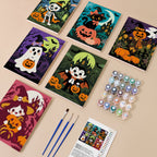 Painting one of the Pumpkin Patch Pals designs next to a stack of mini canvases