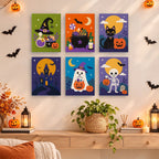 Purple Moon Spooks mini paintings displayed as a gallery wall in a sunny kitchen