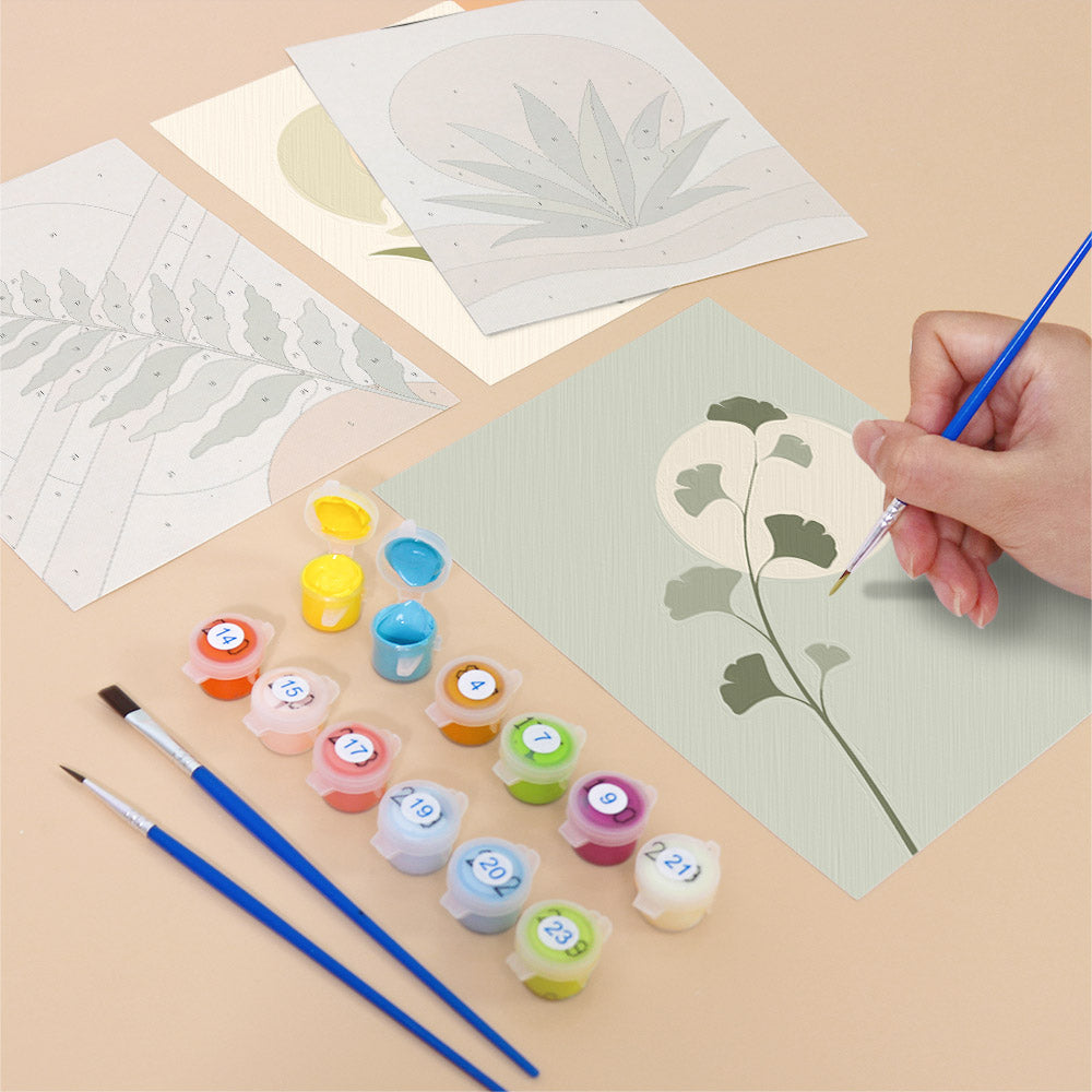 Filling in a Quiet Botanicals mini canvas with numbered acrylic paints and a fine brush