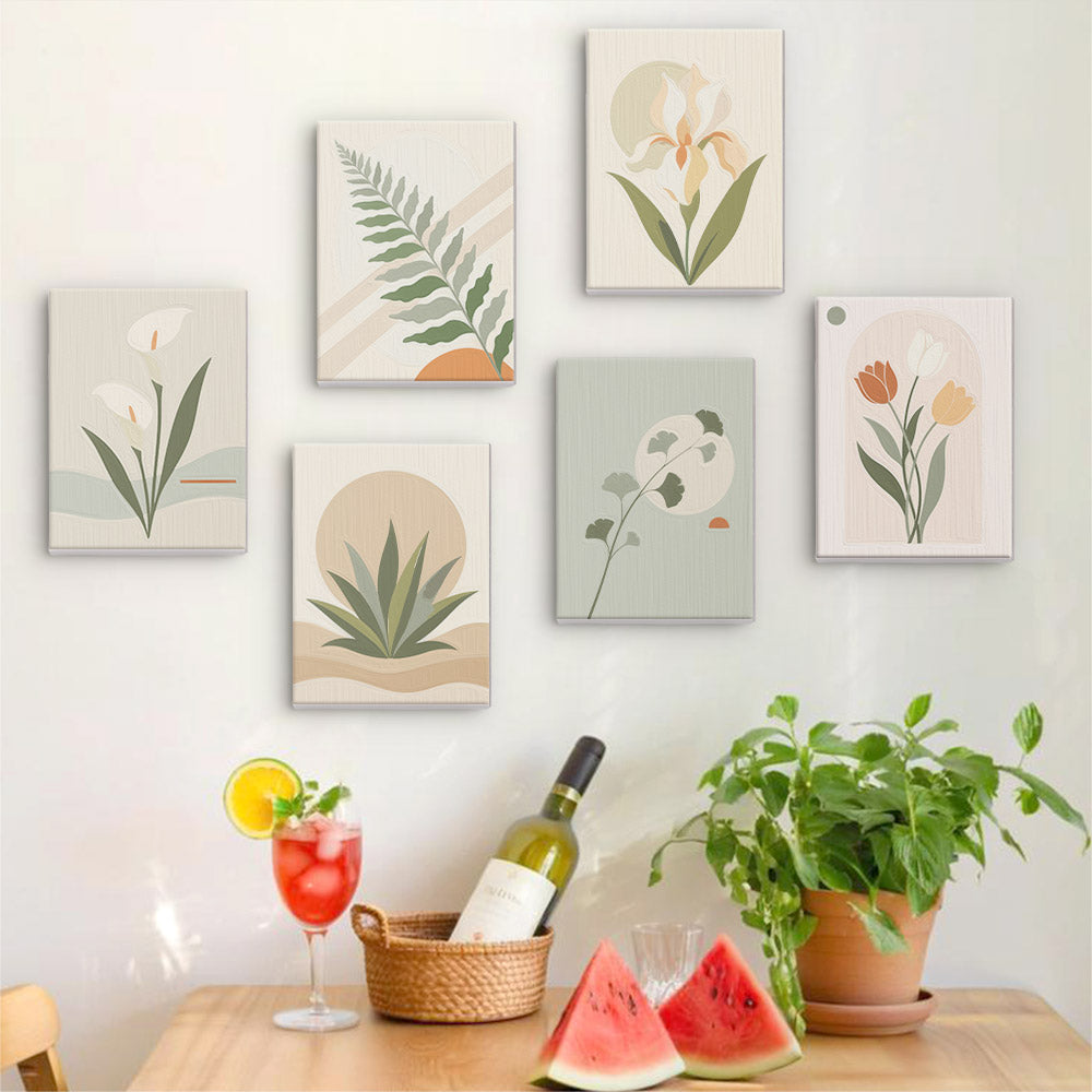 Six finished Quiet Botanicals mini paintings hung on a wall above a table