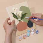 Hand holding a Quiet Vessels mini canvas while painting the details