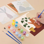 Filling in a Quiet Vessels mini canvas with numbered acrylic paints and a fine brush