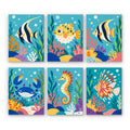 Reef Friends mini paint by numbers set: six coral reef creatures, including striped fish, a pufferfish, a crab, a seahorse and a lionfish