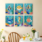 Reef Friends mini paintings displayed as a gallery wall in a sunny kitchen