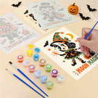 Filling in a Retro Spooky Pals mini canvas with numbered acrylic paints and a fine brush