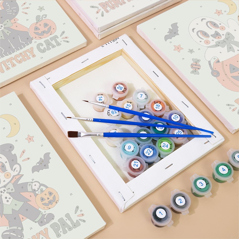 Numbered paint pots and brushes on a pre-stretched Retro Spooky Pals mini canvas