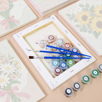 Numbered paint pots and brushes on a pre-stretched Ribbon Bouquets mini canvas