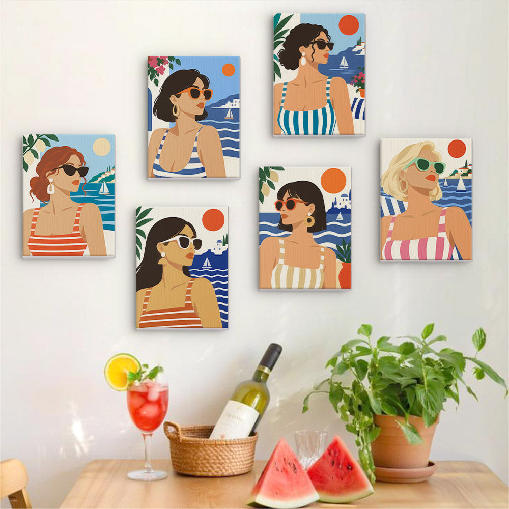 Six finished Riviera Chic mini paintings hung on a wall above a table