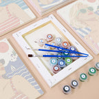 Numbered paint pots and brushes on a pre-stretched Riviera Chic mini canvas