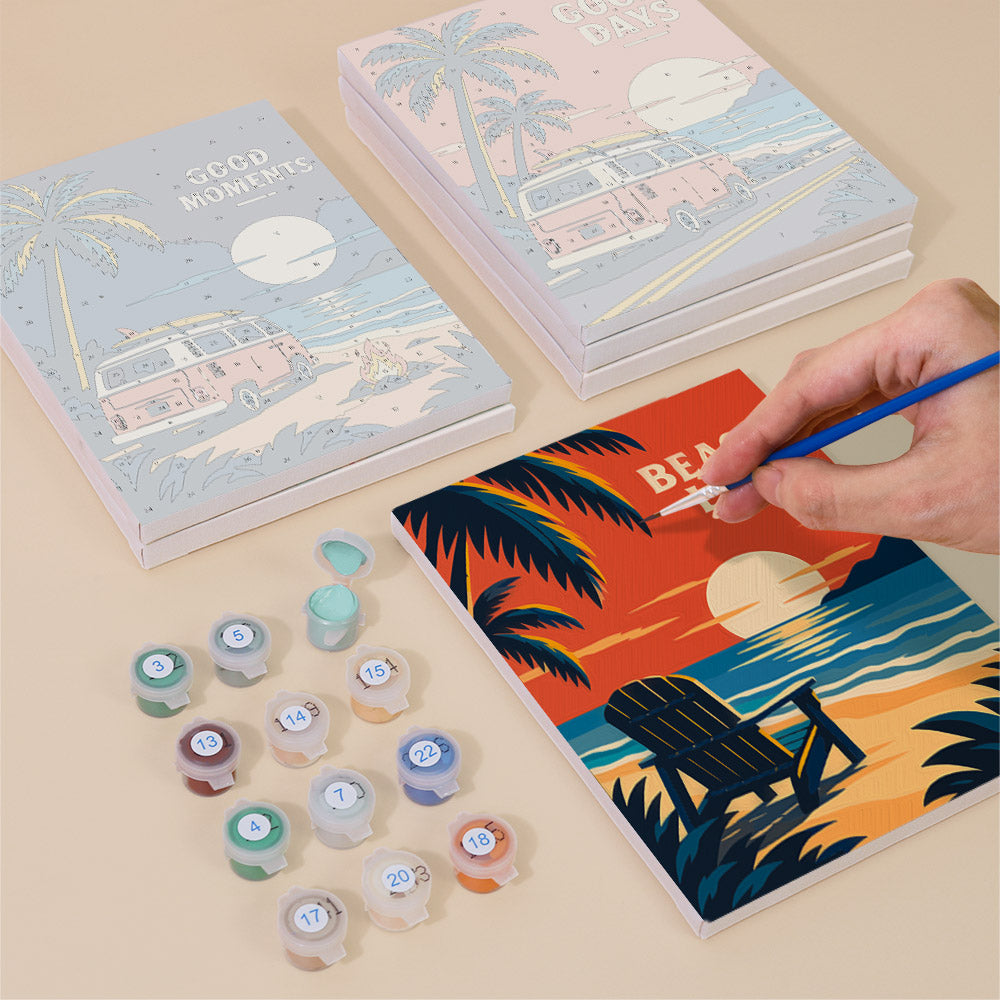 Painting one of the Road Trip Posters designs next to a stack of mini canvases