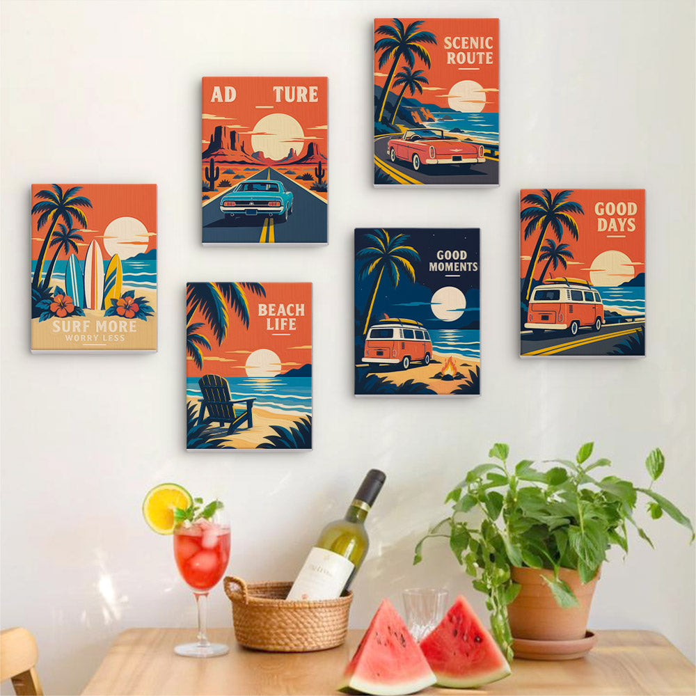Six finished Road Trip Posters mini paintings hung on a wall above a table