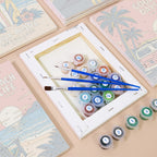 Numbered paint pots and brushes on a pre-stretched Road Trip Posters mini canvas