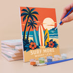 Painting a Road Trip Posters mini canvas propped up beside numbered acrylic paints
