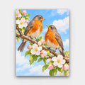 Robins in Blossom paint by numbers kit of two robins on a branch of pink and white apple blossom under a blue sky