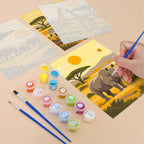 Filling in a Safari Sunset mini canvas with numbered acrylic paints and a fine brush