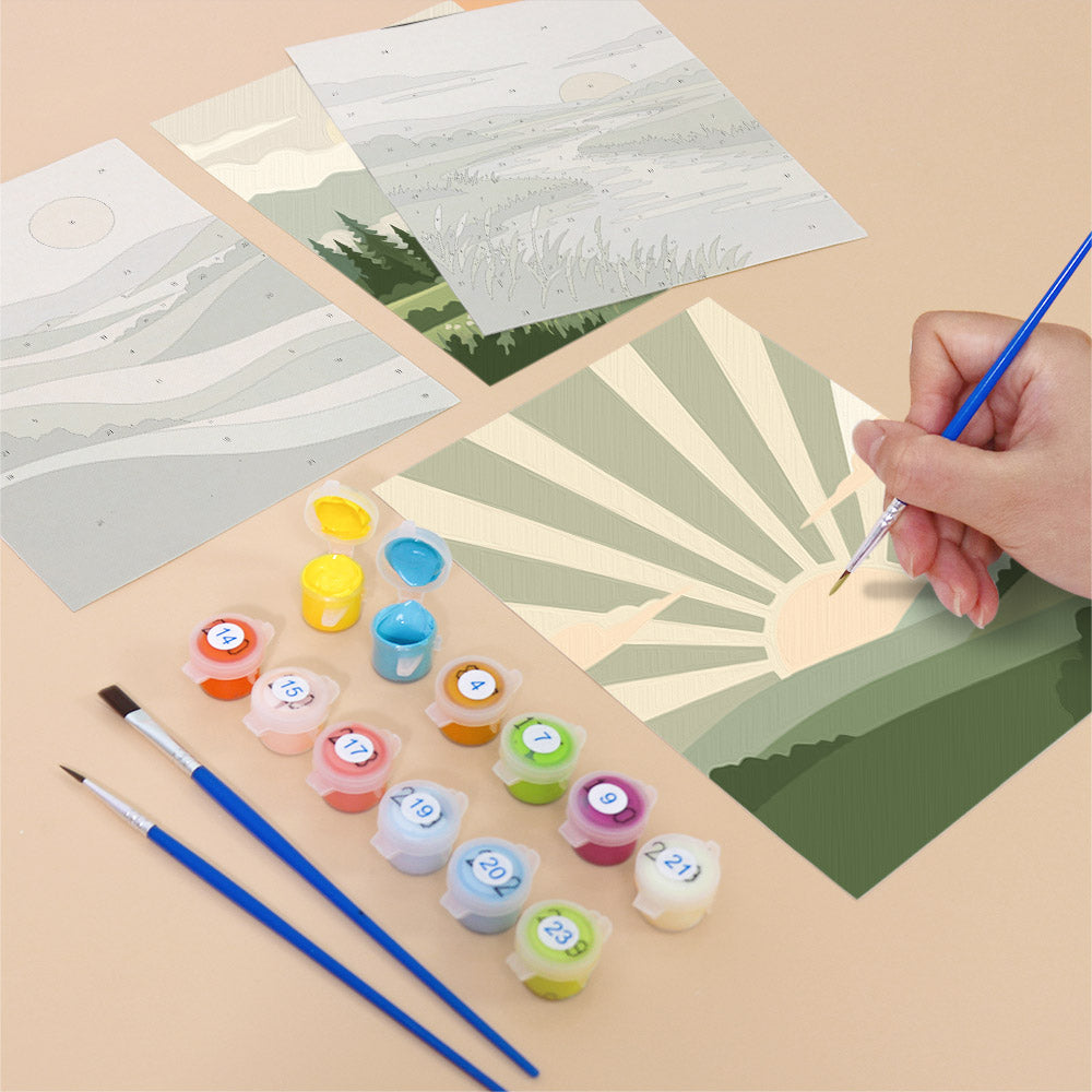 Filling in a Sage Horizons mini canvas with numbered acrylic paints and a fine brush