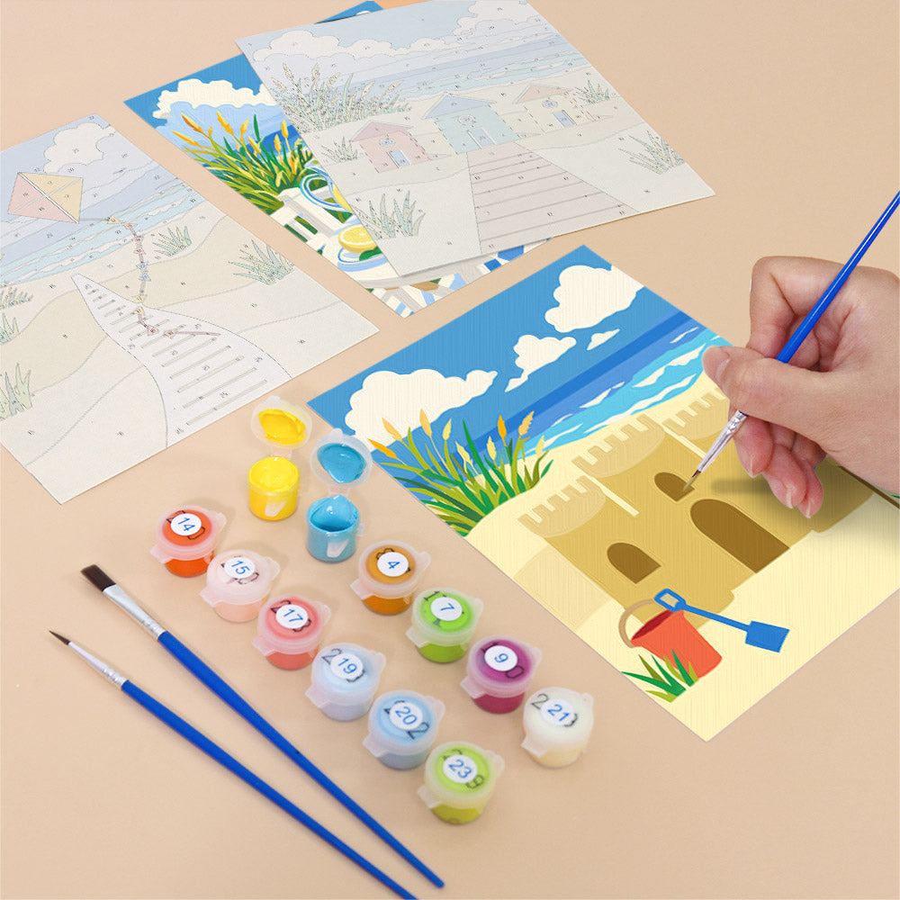 Filling in a Sandy Summer mini canvas with numbered acrylic paints and a fine brush