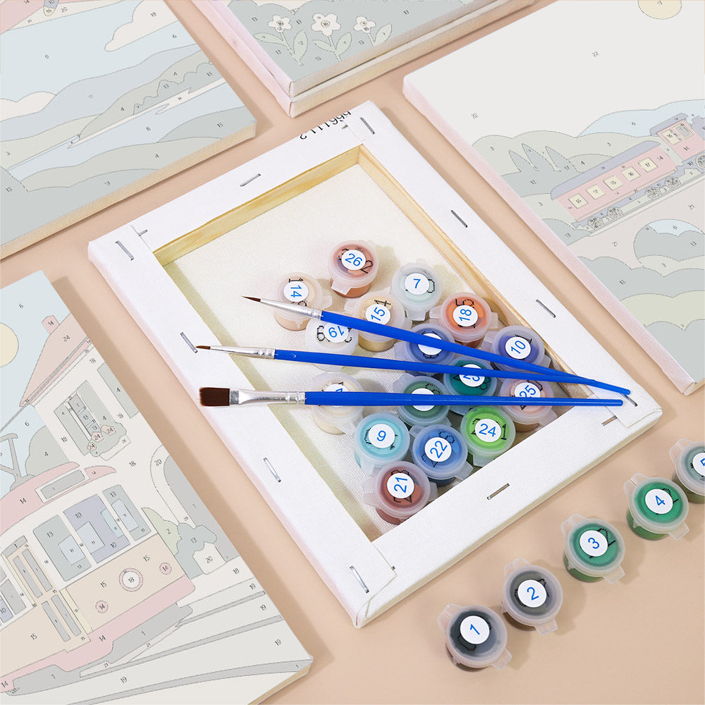 Numbered paint pots and brushes on a pre-stretched Scenic Rides mini canvas