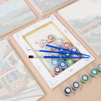 Numbered paint pots and brushes on a pre-stretched Scenic Rides mini canvas