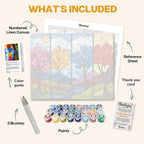 What's included in the Seasons of Glass paint by numbers kit: numbered linen canvas, reference sheet, color guide, 24 acrylic paints, 3 brushes and thank you card