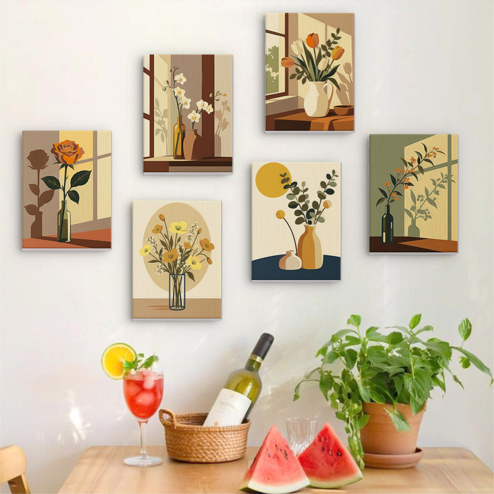 Six finished Shadow and Stems mini paintings hung on a wall above a table