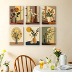 Shadow and Stems mini paintings displayed as a gallery wall in a sunny kitchen