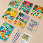 Painting one of the Skeleton Beach Holiday designs next to a stack of mini canvases
