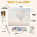 What's included in the Skyborne Kaleidoscope paint by numbers kit: numbered linen canvas, reference sheet, color guide, 24 acrylic paints, 3 brushes and thank you card