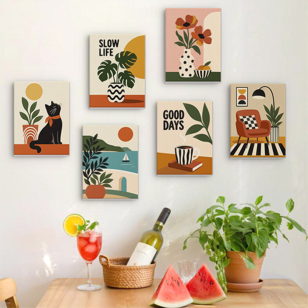 Six finished Slow Life mini paintings hung on a wall above a table