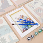 Numbered paint pots and brushes on a pre-stretched Slow Life mini canvas