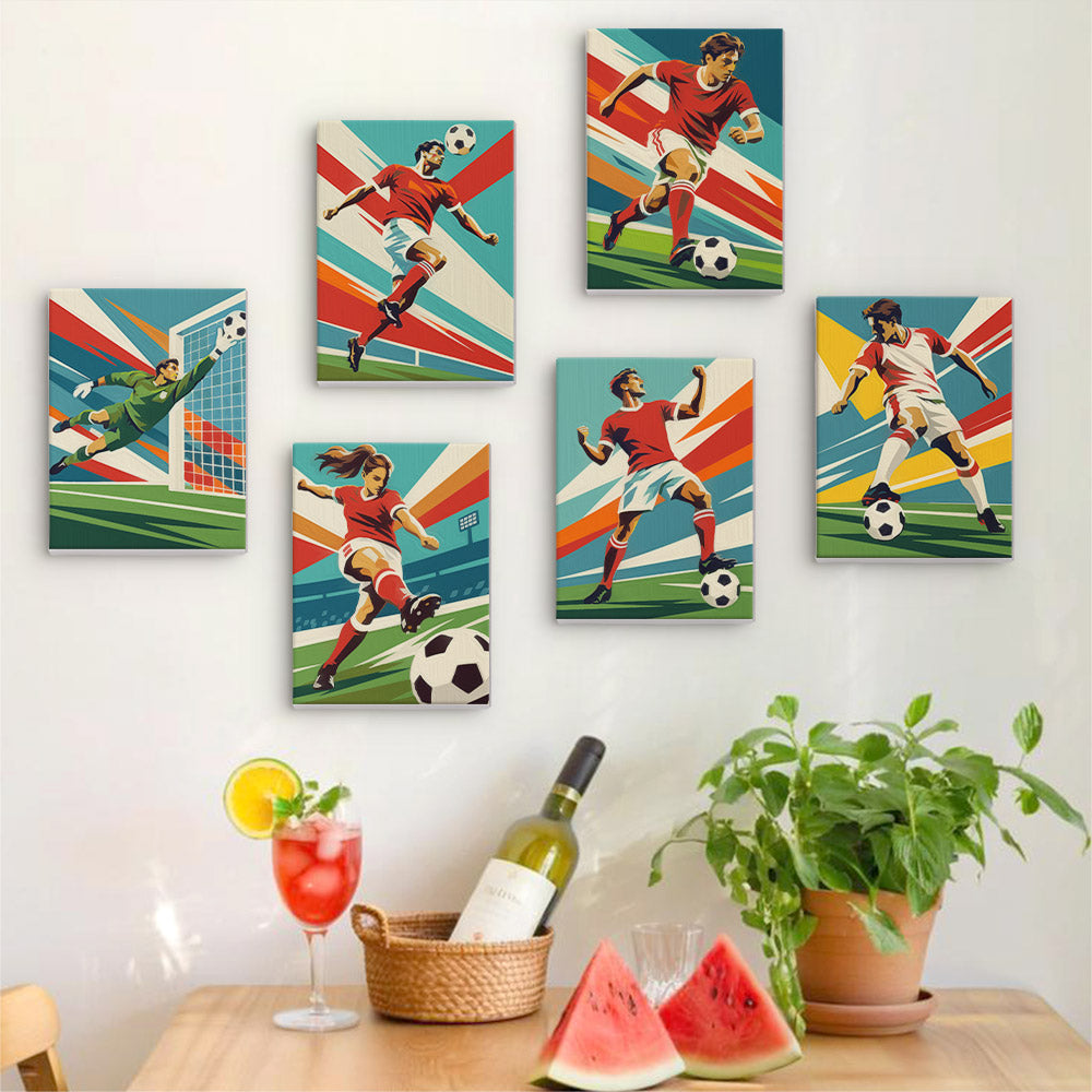Six finished Soccer Glory mini paintings hung on a wall above a table
