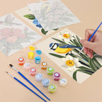 Filling in a Songbird Blooms mini canvas with numbered acrylic paints and a fine brush