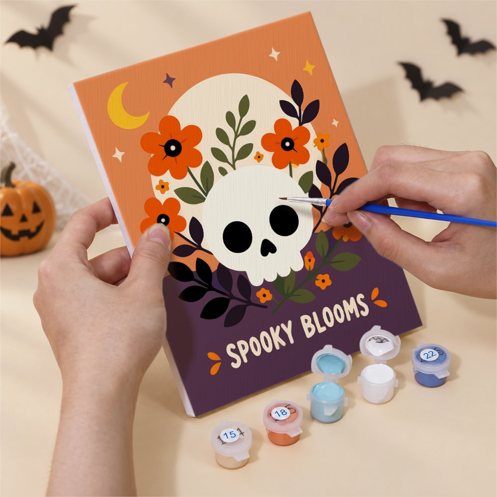 Numbered paint pots and brushes on a pre-stretched Spooky Blooms mini canvas
