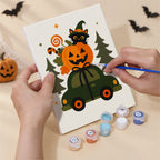 Numbered paint pots and brushes on a pre-stretched Spooky Holiday Crossover mini canvas