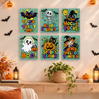 Painting a Spooky Season Slogans mini canvas propped up beside numbered acrylic paints