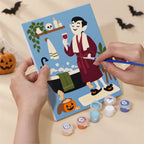 Numbered paint pots and brushes on a pre-stretched Spooky Spa Day mini canvas
