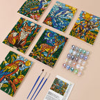 Stained Glass Wildlife mini paint by numbers kit with six numbered canvases, acrylic paints, brushes and layout