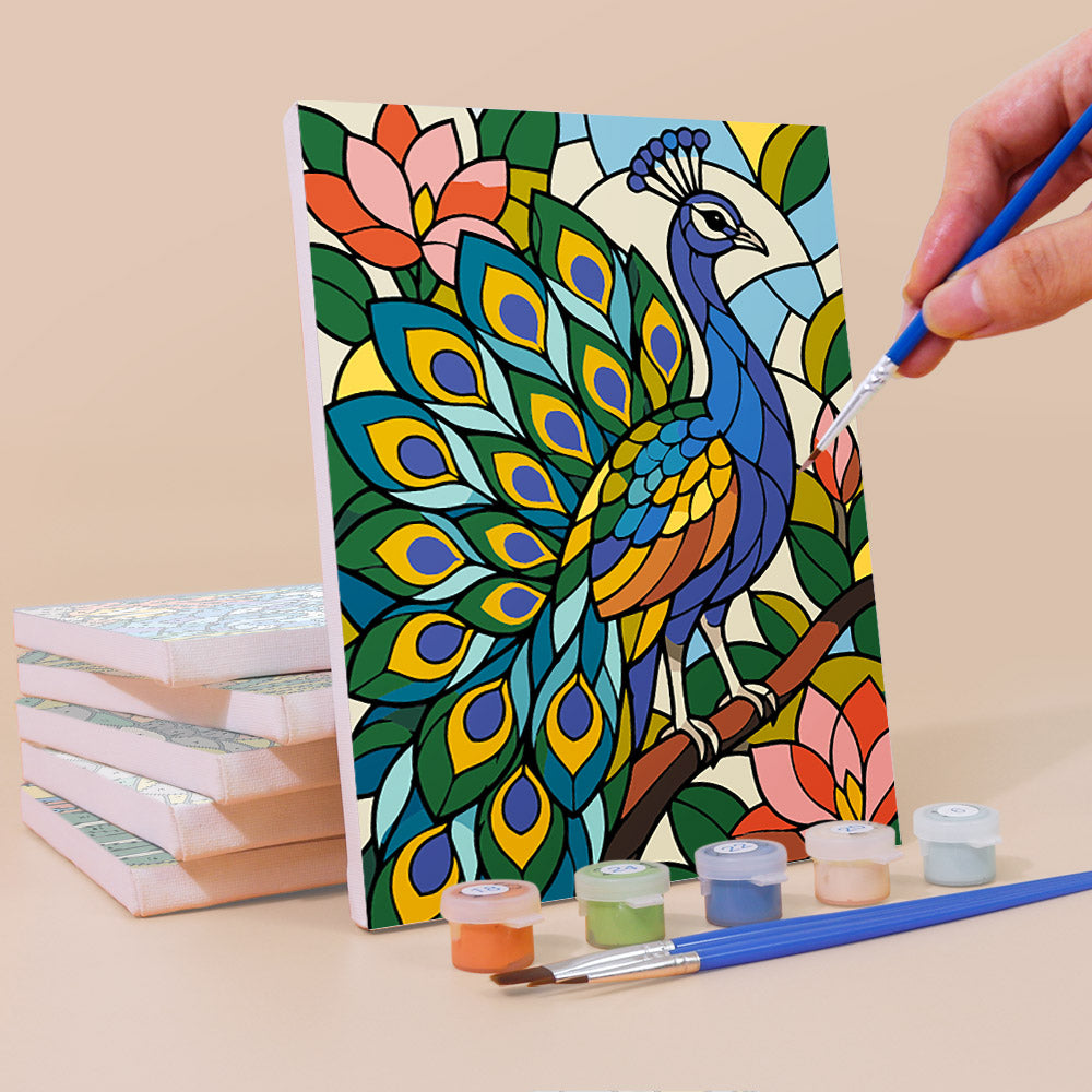 Painting a Stained Glass Wildlife mini canvas propped up beside numbered acrylic paints