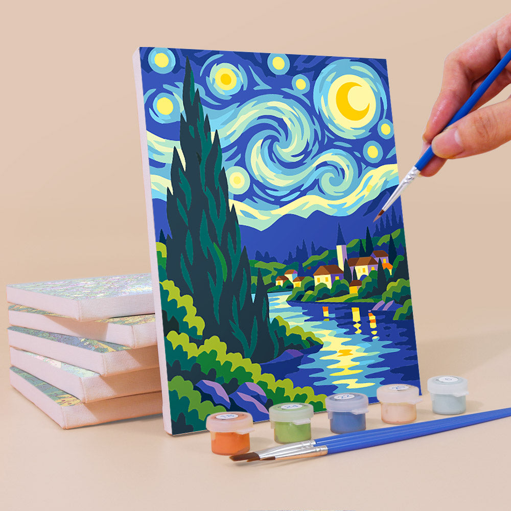 Painting a Starry Swirls mini canvas propped up beside numbered acrylic paints