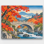 Stone Bridge in Autumn paint by numbers kit of a stone arch bridge over a rushing stream with red maples and a pagoda